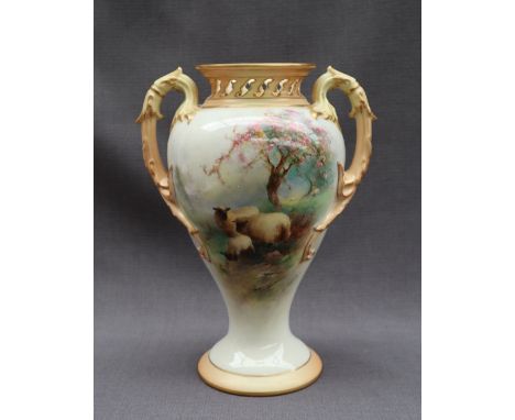 A Royal Worcester twin handled pot pourri vase of inverted baluster form with a pierced flared rim and inner lid with natural