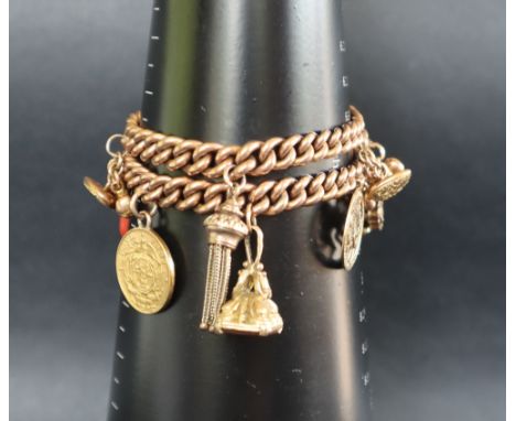 A 9ct gold bracelet with individually hallmarked twisted links set with numerous charms including a 9ct gold claw holding a s