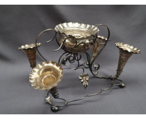 A George V silver epergne, with a central flared bowl and four trumpets on a naturalistic, leaf applied scrolling stand, Birm