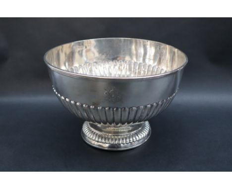 A late Victorian silver pedestal bowl of circular form with a half gadrooned body on a spreading foot, Sheffield, 1900, Willi