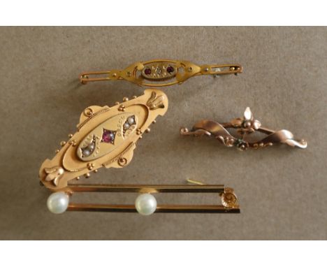 A 9ct gold bar brooch paste and seed pearl set together with two other 9ct gold bar brooches, approximately 8 grams and a fau