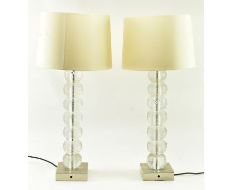 Porta Romana - a pair of contemporary high end design spun clear glass desk table lamps. Each light having a series of spun g