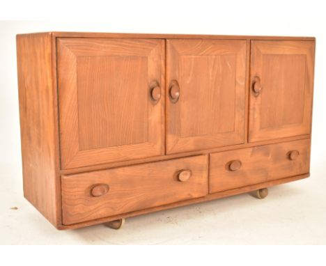 Lucian Ercolani for Ercol - Model 366 - A retro 1960s beech and elm sideboard credenza in blonde. The sideboard comprises a f