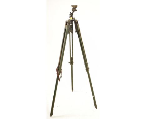 A retro mid 20th century circa 1952 metal &amp; wooden military survey tripod stand. The stand having a metal mount over a th