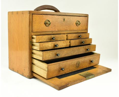 A retro 20th century CQR oak&nbsp;engineers / workman's tool chest. The chest having a leather handle to top over a full leng