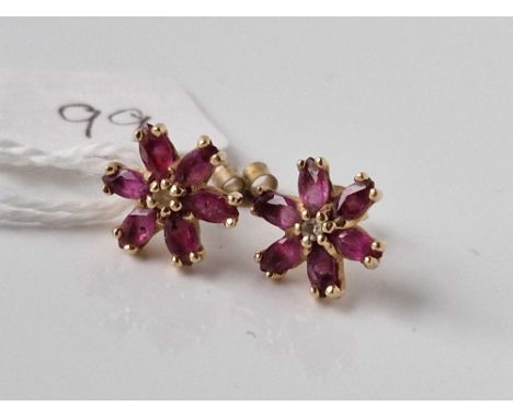 A pair of ruby floral earrings 9ct 1.6 gms