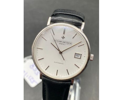 A GENTS VACHERON WHITE GOLD WRIST WATCH 18CT GOLD WITH SECONDS SWEEP AND DATE APERTURE WITH ORIGINAL STRAP