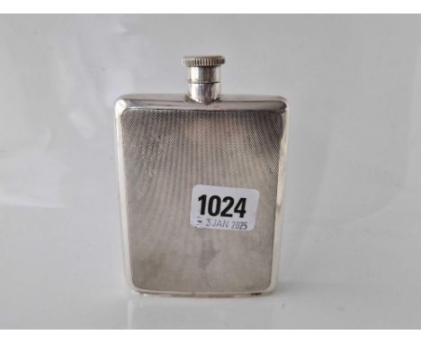 A good quality hip flask of curved outline, screw cover, 5" high, Birmingham 1970, 140g