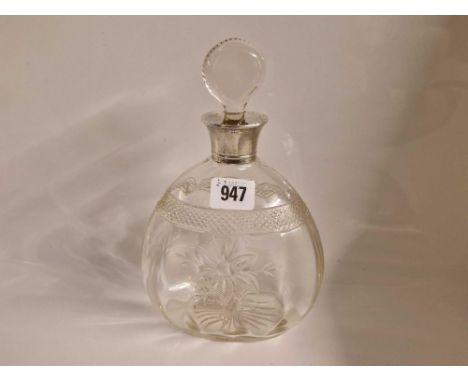 Cut glass decanter and stopper with silver neck. 9.5 in high. Birmingham 1910