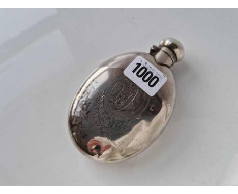 An oval Victorian flask engraved with contemporary initials, Birmingham 1890 by D &amp; F, 120g