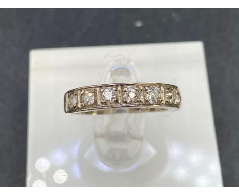 A DIAMOND HALF ETERNITY RING SET WITH BRILLIANT CUT DIAMONDS 18CT GOLD 