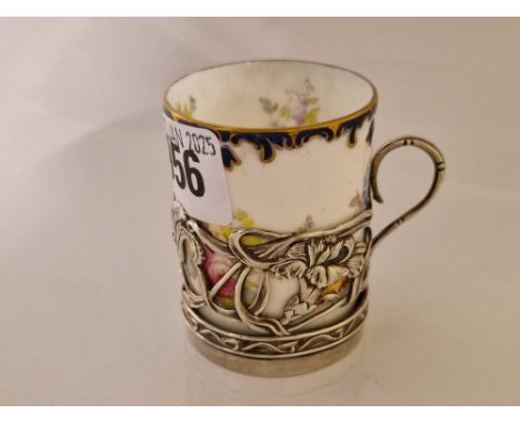 Silver mounted Art Nouveau cup holder with a Cauldon porcelain cup. London 1901