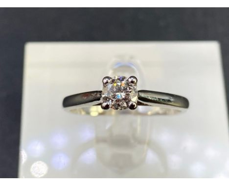 A good white diamond solitaire ring Size M 9ct