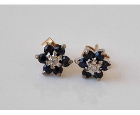 A pair of sapphire cluster and diamond ear studs 9ct