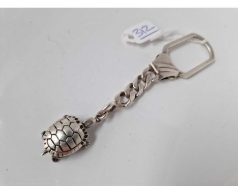 A hallmarked silver tortoise key ring