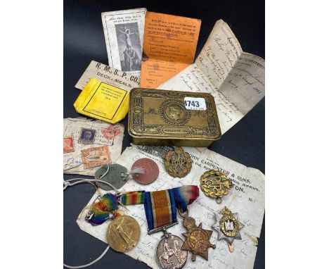 A trio of WWI medals to Pte P Bawden (No 9555) Devon Reg with brass 1914 box, 2 dog, 2 reference letters, Regiment Cap Badge 