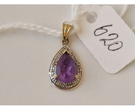 A amethyst and diamond pendant 9ct