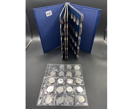 Coin book with a few coins