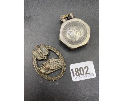 A trench hexagonal lighter &amp; a German tank regiment badge