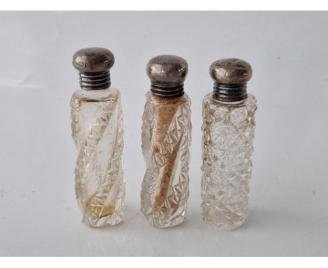 Three scent files with cut glass bodies