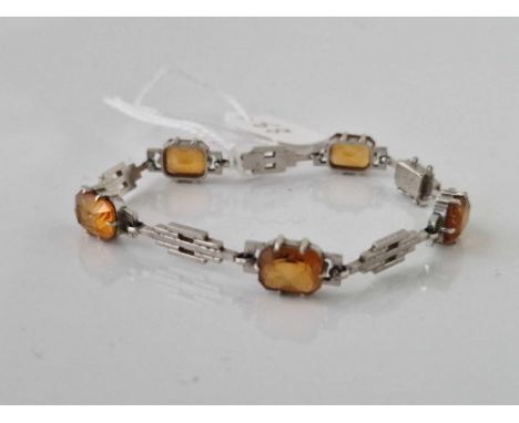 A ART DECO WHITE GOLD AND CITRINE BRACELET 9CT 6.5 INCH 9,8 GMS