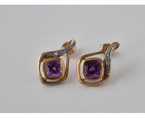 A pair of diamond and amethyst earrings 9ct 1.9 gms