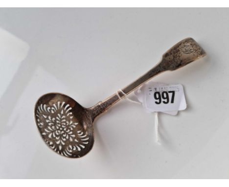 A Victorian fiddle pattern sifter spoon with oval bowl, London 1860 by SH, DC, 46g