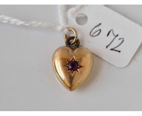 A antique heart charm with ruby 15ct gold 1.7 gms