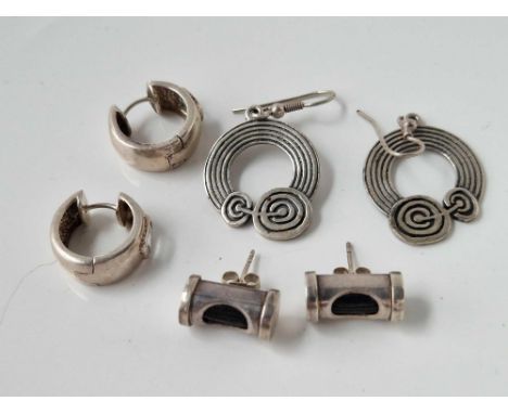 Three pairs of designer silver earrings