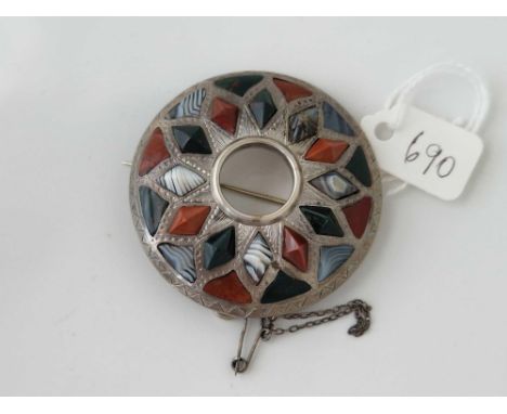 A large Scottish silver and agate set circular brooch