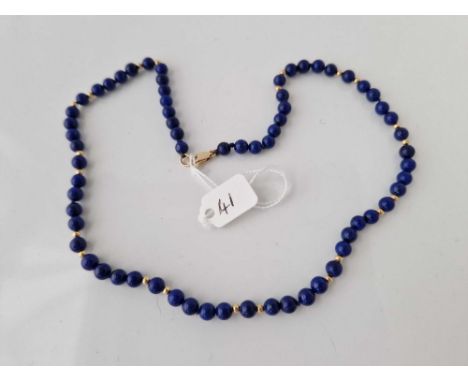 A lapis lazuli and gold bead necklace 14ct gold 18 inch 22 gms