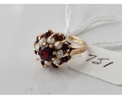 A pearl and garnet ring 9ct size H 2.4 gms