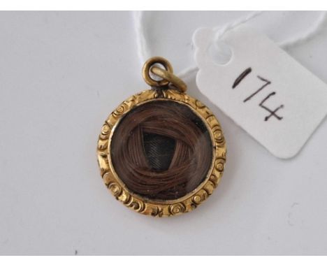 A early hair pendant with 1856 inscription