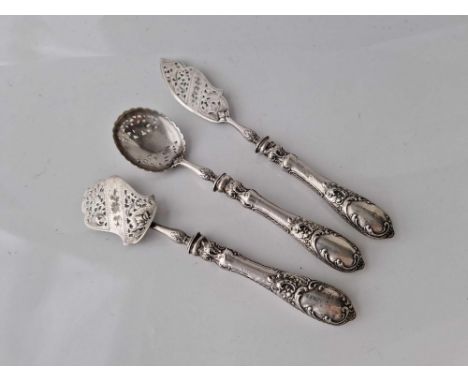 A Set of Three Decorative French Silver Mounted Servers