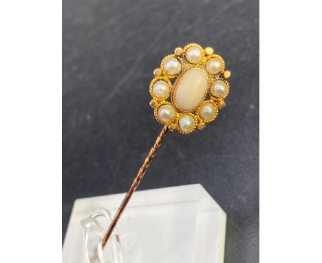 A antique coral and real pearl large cluster stick pin in high carat