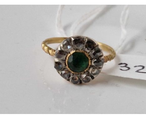 Antique Georgian rose diamond and emerald ring with carved gold shank, with a glazed locket compartment to the back of the he