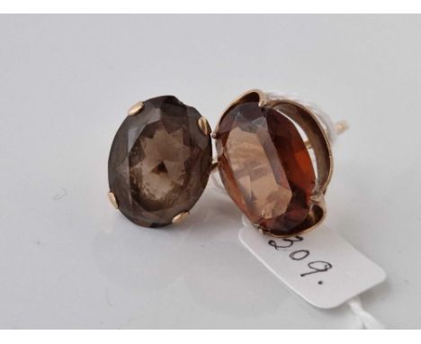 Two smokey quartz dress rings 9ct size I and L 12.9 gms inc.