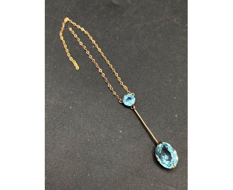 A Edwardian topaz drop pendant AF