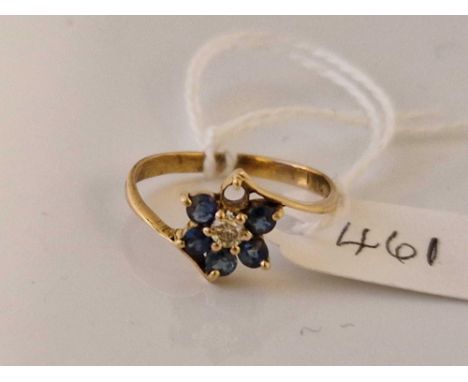 A sapphire and diamond flower head ring 18ct gold size O 1.5 gms