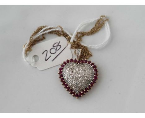 A diamond and ruby heart pendant necklace 9ct 17 inch 4 gms