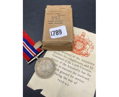 A WWII 1939/45 medal with box to D Williams