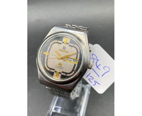 A gents RICOH CRYSTAL automatic wrist watch with seconds sweep and date aperture W/O