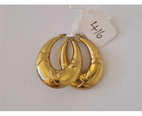 A pair of hoop earrings 9ct 4.1 gms