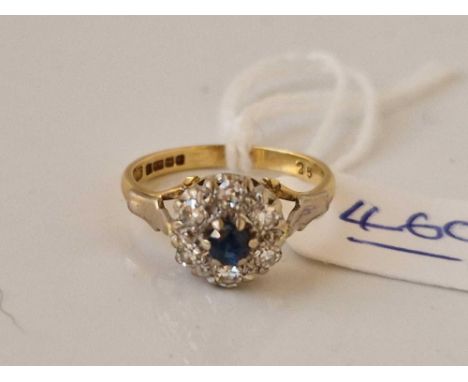 A SAPPHIRE AND DIAMOND CLUSTER RING 18CT GOLD SIZE K 3.1 GMS