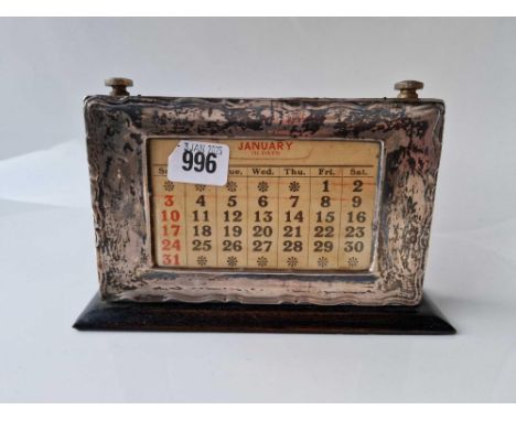 A silver framed desk calendar, 7" wide, Birmingham 1926