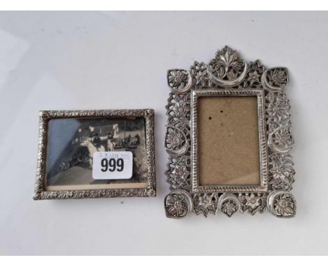 A small 800 standard frame with pierced boarder &amp; an Indian white metal frame, 5.5" high