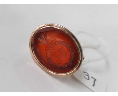 Antique Georgian gold fob seal set with a carnelian crested intaglio