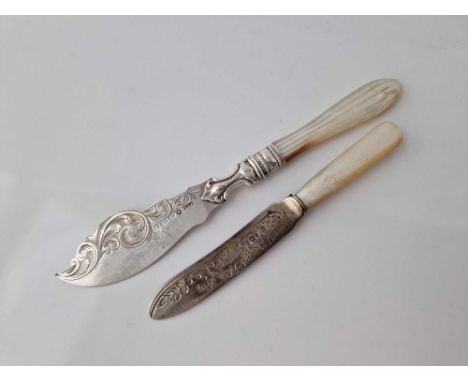 Early Victorian engraved butter knife with M O P handle. Birmingham 1882 By H &amp; T and another 1901