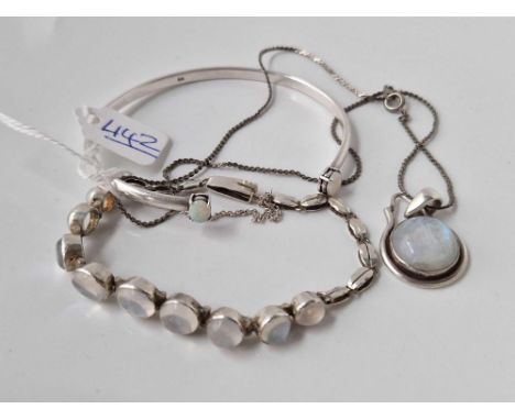 A sterling silver moonstone necklaces and bracelet and silver and opal bangle