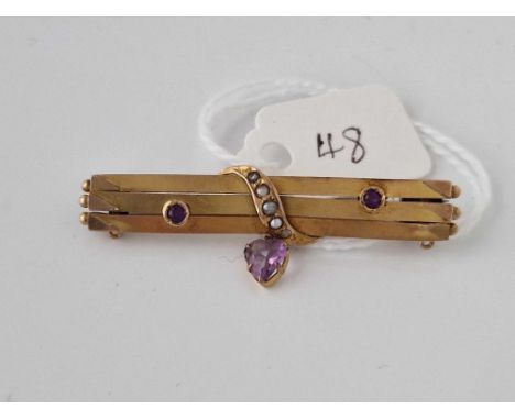 A Victorian amethyst and pearl brooch with amethyst heart drop 9ct